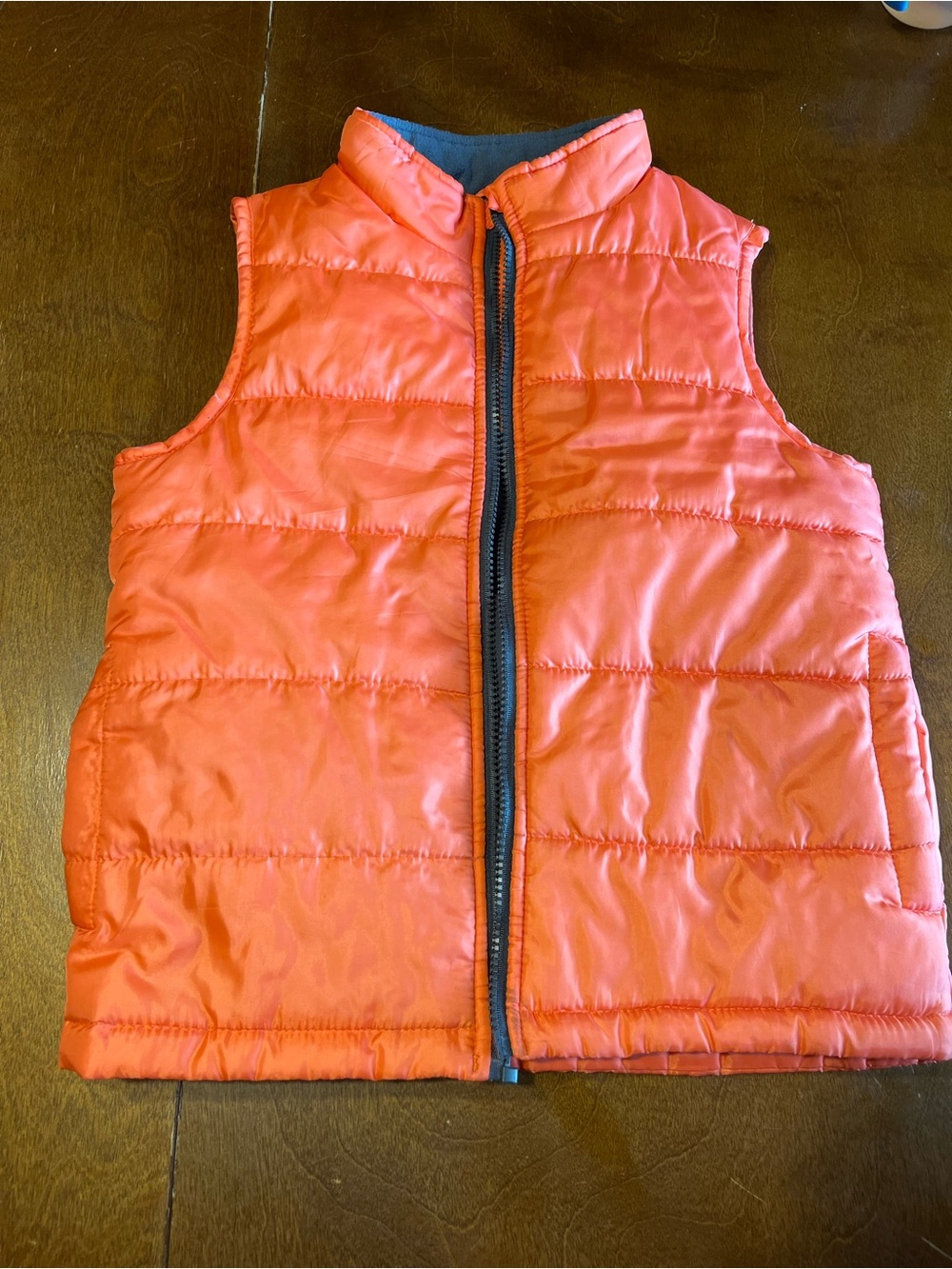 OshKosh B’gosh- reversible padded vest for children.